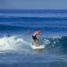 Surfers in El Guincho beach