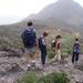 People walking down all the way to Camino Su�rez - Finca Su�rez and Roque Imoque in the background